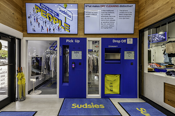 Sudsies Dry Cleaning store interior with pickup and drop-off stations